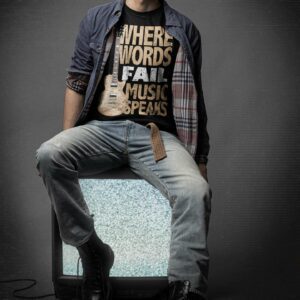 Music Speaks Unisex T-Shirt - bella canvas t shirt mockup of a man wearing s grunge style garments m - Shujaa Designs