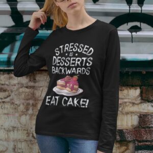 Stressed Is Desserts Backwards Eat Cake Unisex Heavy Blend™ Crewneck Sweatshirt - long sleeve tee mockup of a woman touching her hair - Shujaa Designs