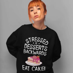 Stressed Is Desserts Spelled Backwards Eat Cake Unisex Heavy Blend™ Crewneck Sweatshirt - mockup of a red hair girl wearing a crewneck sweater - Shujaa Designs